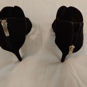 One pair. Blk suede 2"  heels.